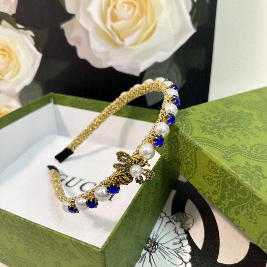 HAIRBAND EMBELLISHED DIAMOND AND PEARL IN GOLD METAL 376822