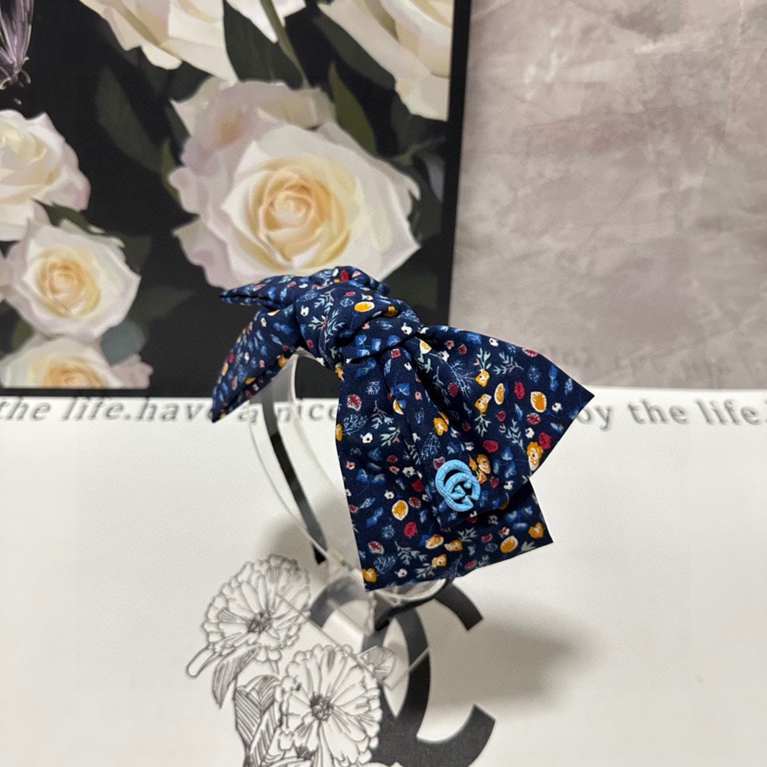 HAIRBAND IN NAVY BLUE FLORAL FABRIC 385854