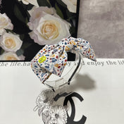 HAIRBAND IN WHITE FLORAL FABRIC 385855