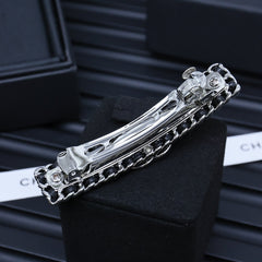 CHANEL 25P LEATHER-THREADED HAIR CLIP