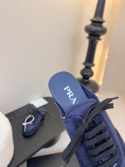 SNEAKER MULES IN NAVY BLUE NYLON AND SUEDE