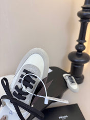 SNEAKER MULES IN BEIGE SUEDE AND WHITE NYLON