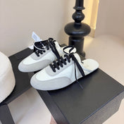 SNEAKER MULES IN BEIGE SUEDE AND WHITE NYLON