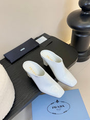 HIGH HEEL MULES WITH GOLD LETTERING LOGO IN WHITE GLOSSY CALFSKIN