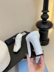 HIGH HEEL MULES WITH GOLD LETTERING LOGO IN WHITE GLOSSY CALFSKIN