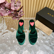ALAIA PLATFORM WEDGE IN GREEN FOREST VELVET WITH HEART EMBROIDERED