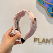 HAIRBAND WITH FLOWER PRINT IN BABY PINK SILK 398863