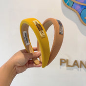 THICK HEADBAND IN YELLOW DIAGONAL LEATHER 425478