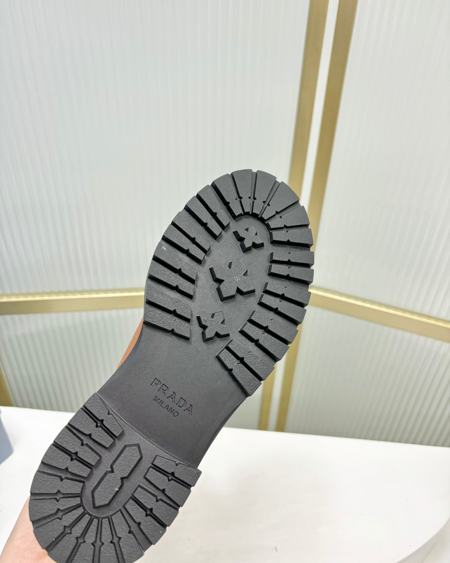 KNEE BOOTS WITH TRIANGLE LOGO IN CAMEL CALFSKIN