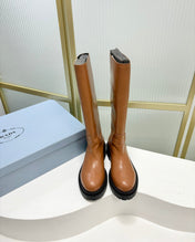 KNEE BOOTS WITH TRIANGLE LOGO IN CAMEL CALFSKIN