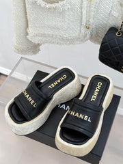 PLATFORM SLIPPERS IN BLACK LAMBSKIN