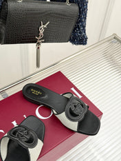 SLIDE SANDALS IN BLACK AND WHITE CALFSKIN