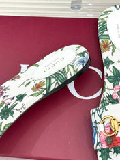 SLIDE SANDALS IN WHITE FABRIC FLORAL AND LEAF PRINT