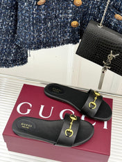 SLIDE SANDALS IN BLACK CALFSKIN WITH GOLD HARDWARE