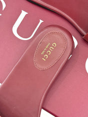 SLIDE SANDALS IN RED CALFSKIN WITH GOLD HARDWARE