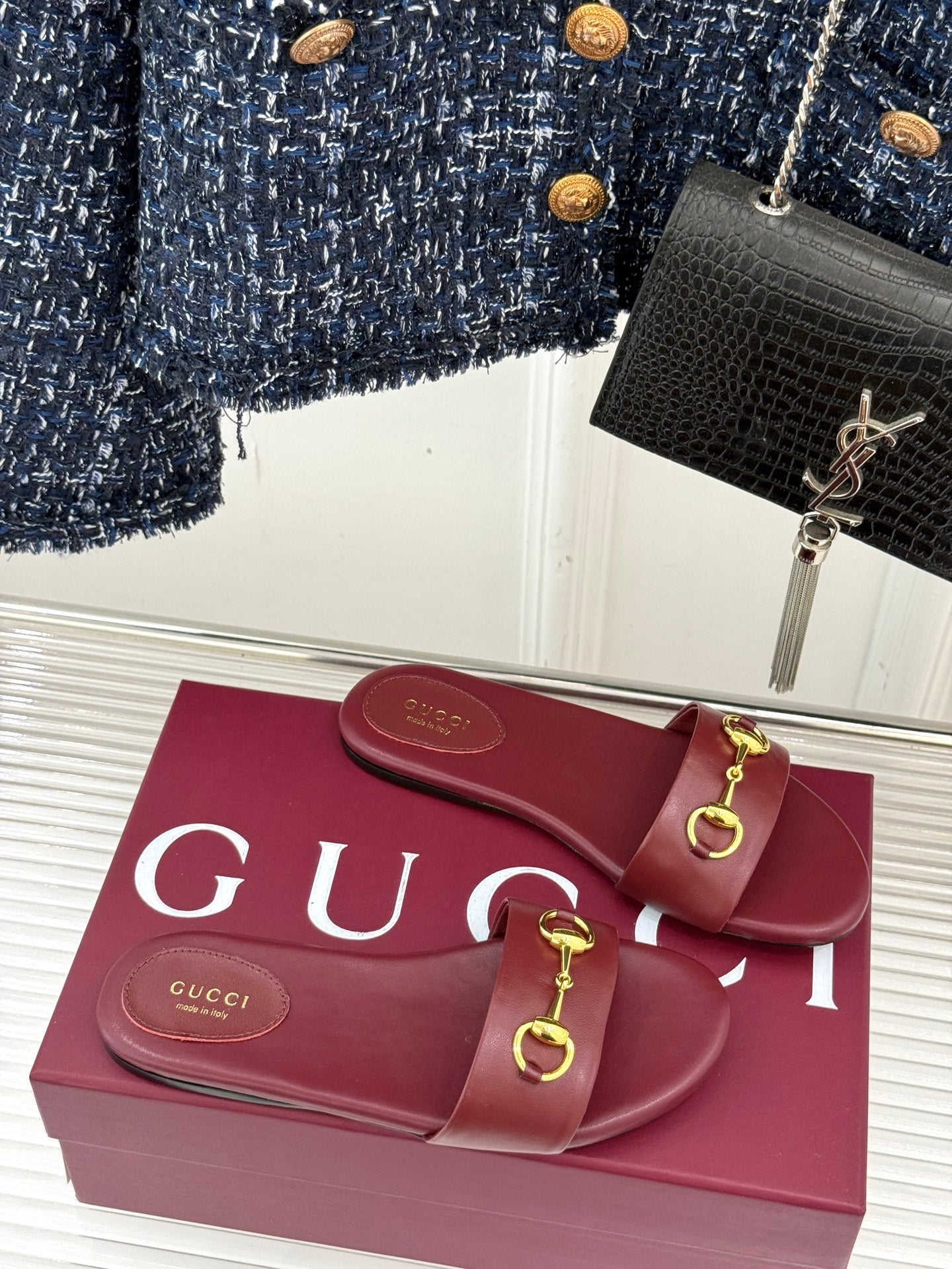 SLIDE SANDALS IN RED CALFSKIN WITH GOLD HARDWARE