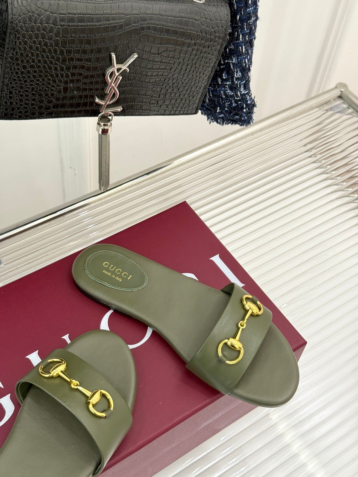 SLIDE SANDALS IN MOSS GREEN CALFSKIN WITH GOLD HARDWARE