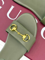 SLIDE SANDALS IN MOSS GREEN CALFSKIN WITH GOLD HARDWARE