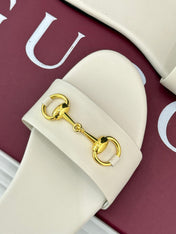 SLIDE SANDALS IN WHITE CALFSKIN WITH GOLD HARDWARE