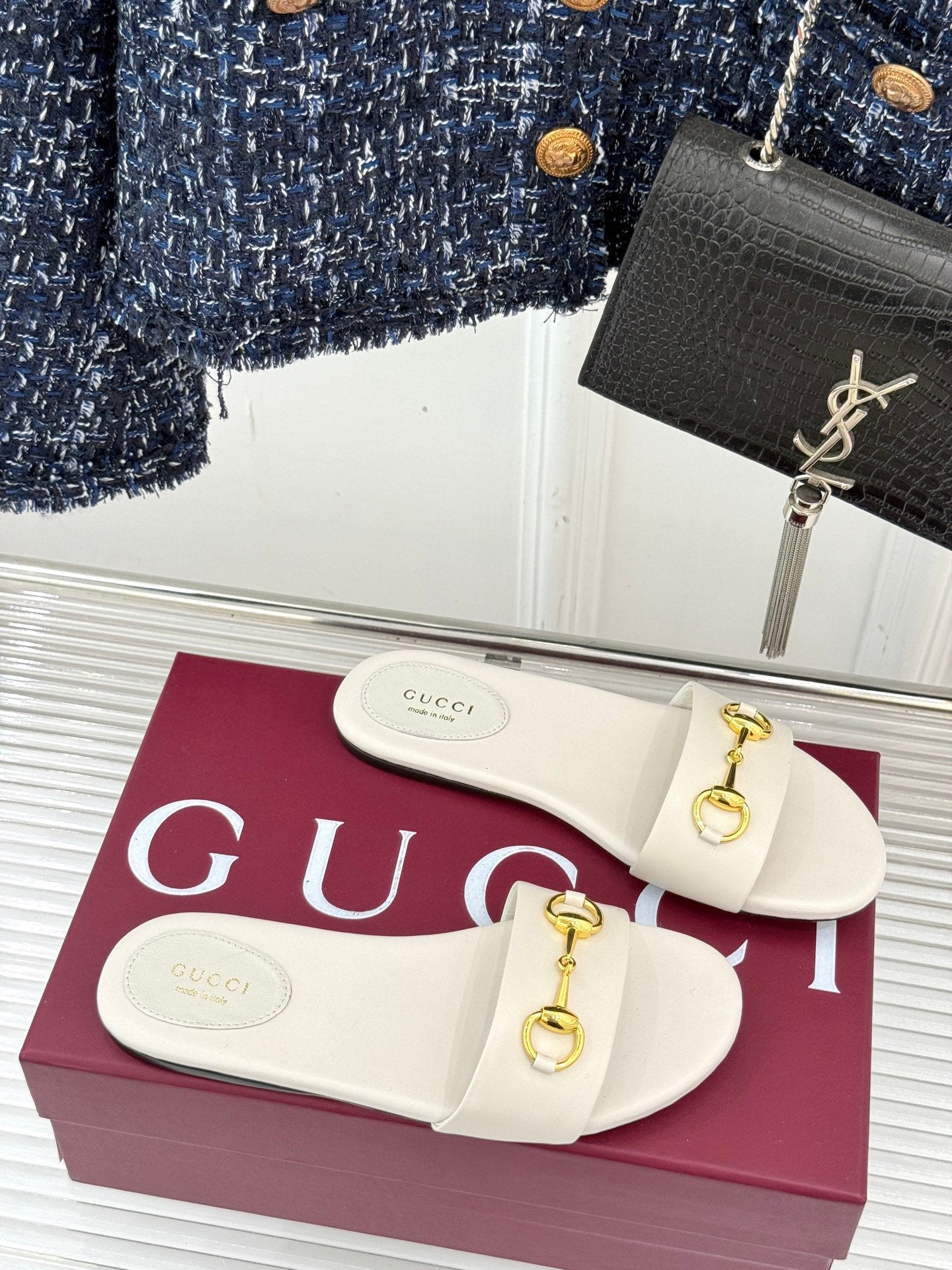 SLIDE SANDALS IN WHITE CALFSKIN WITH GOLD HARDWARE