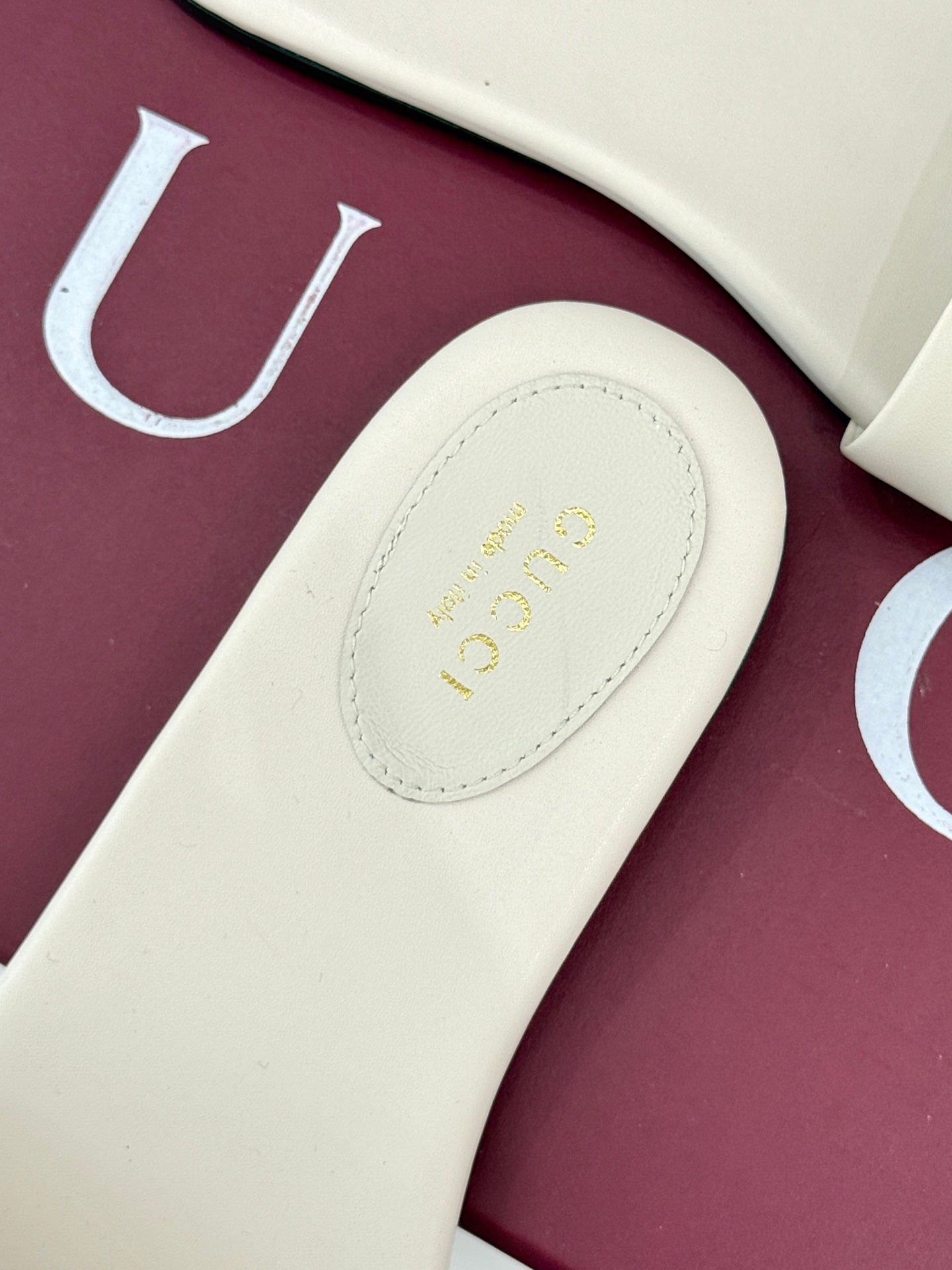 SLIDE SANDALS IN WHITE CALFSKIN WITH GOLD HARDWARE