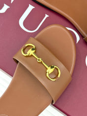 SLIDE SANDALS IN BROWN CALFSKIN WITH GOLD HARDWARE