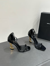 YSL HEELED SANDALS 25S 105 MM IN BLACK GLOSSY LAMBSKIN WITH GOLD HARDWARE
