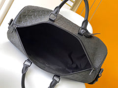 LV 25S KEEPALL BANDOULIÈRE BAG 50 IN BLACK EMBOSSED TAURILLON CALFSKIN MONOGRAM