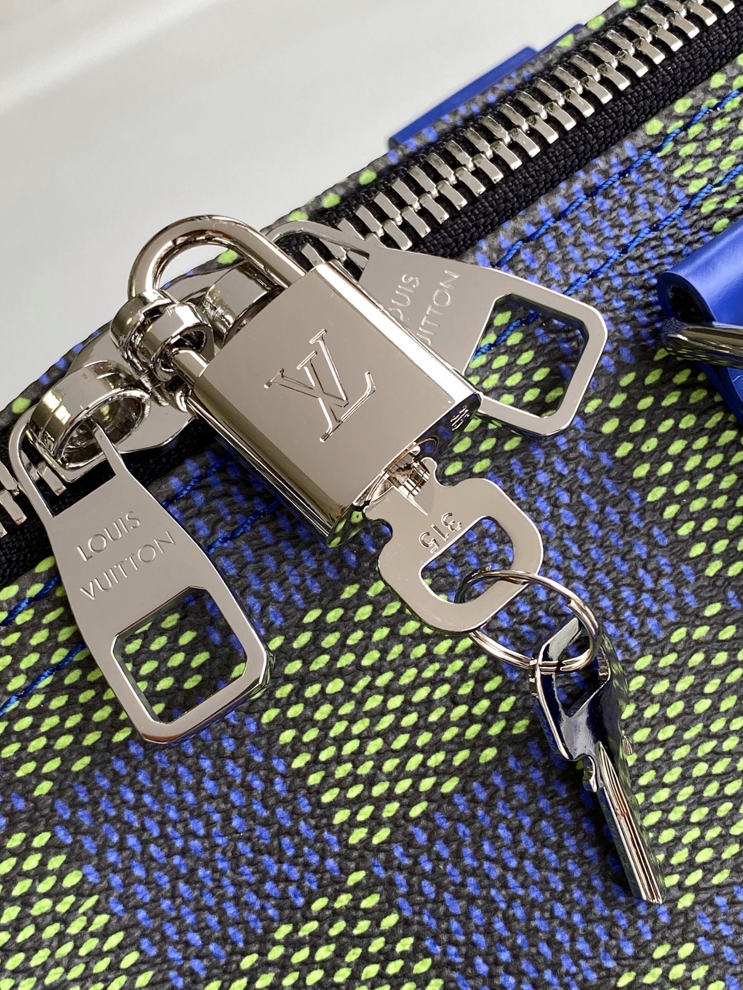 KEEPALL BANDOULIÈRE 50 IN BLUE GREEN DAMIER HERITAGE COATED CANVAS