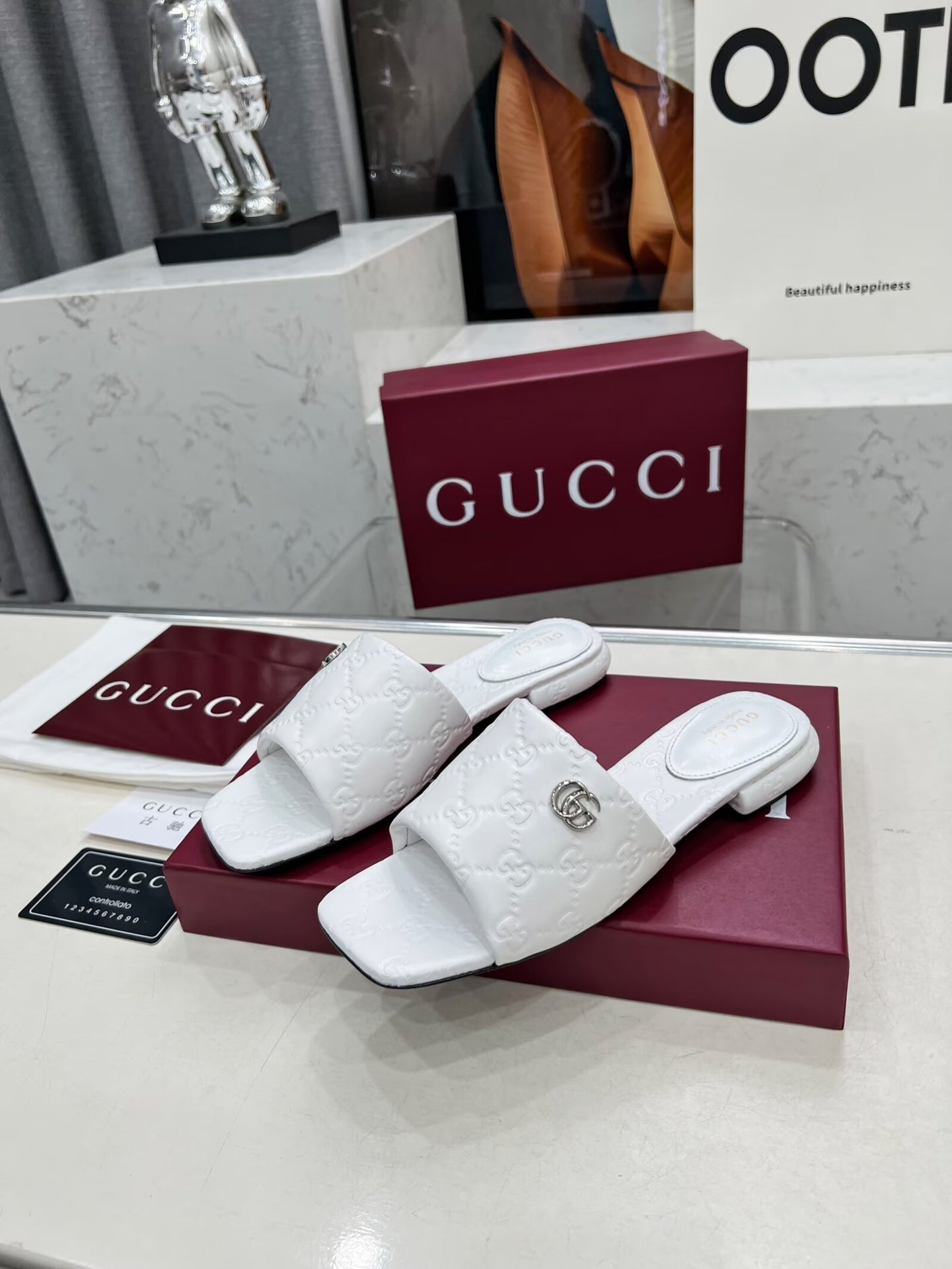 GG CASUAL SLIPPERS IN WHITE CALFSKIN LOGO EMBOSSING