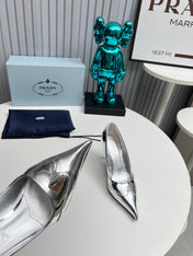 HIGH POINTED-TOE PUMPS IN SILVER GLOSSY CALFSKIN