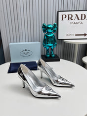 HIGH POINTED-TOE PUMPS IN SILVER GLOSSY CALFSKIN