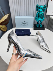 HIGH POINTED-TOE PUMPS IN SILVER GLOSSY CALFSKIN