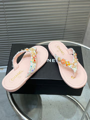 THONG SLIPPERS IN LIGHT PINK SOFT LEATHER WITH LOGO STICKER DETAIL