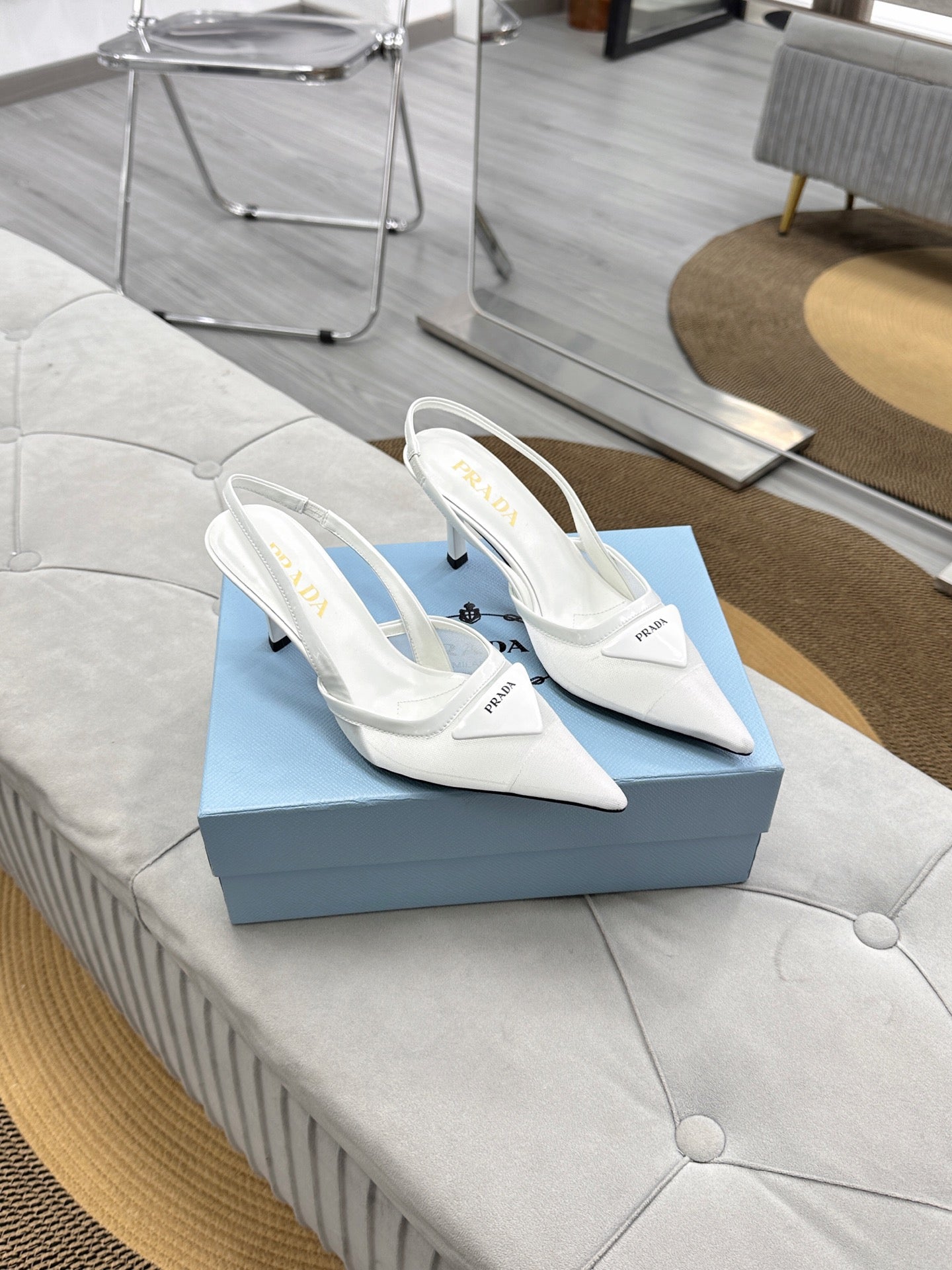 PRADA 25S TRIANGLE LOGO SLINGBACK PUMPS IN WHITE MESH FABRIC