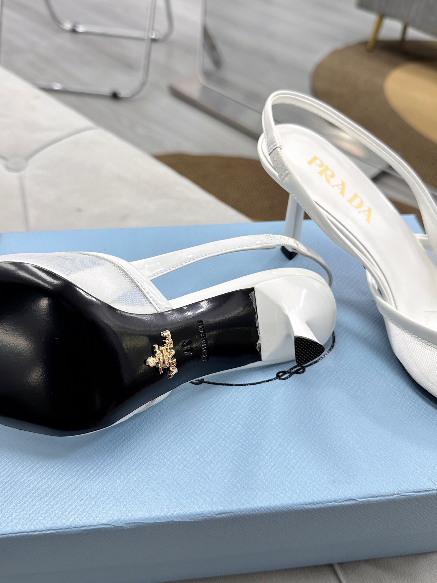 PRADA 25S TRIANGLE LOGO SLINGBACK PUMPS IN WHITE MESH FABRIC