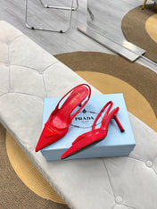 PRADA 25S TRIANGLE LOGO SLINGBACK PUMPS IN RED MESH FABRIC