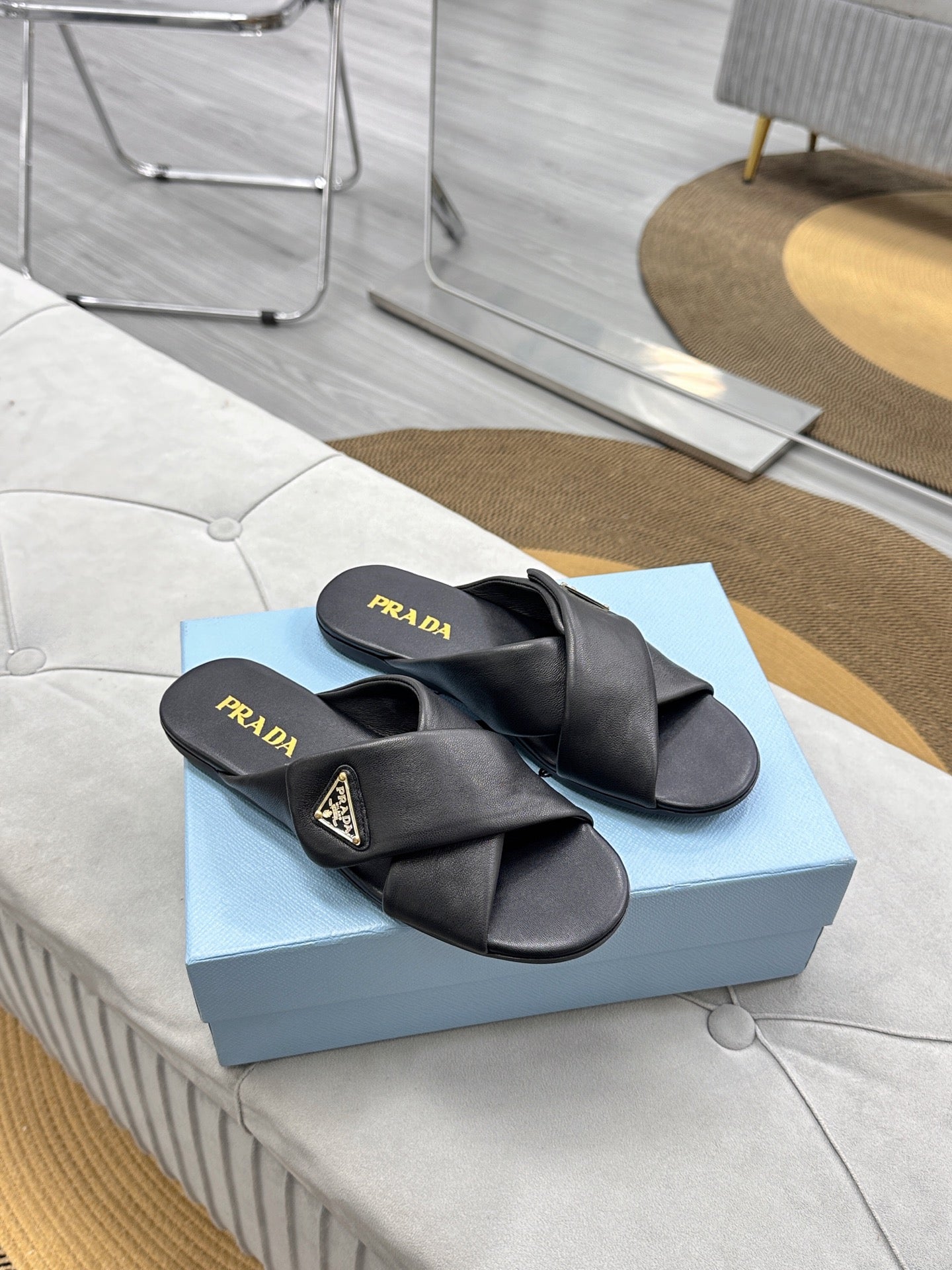 PRADA 25S SLIDE SANDALS IN BLACK CALFSKIN LOGO