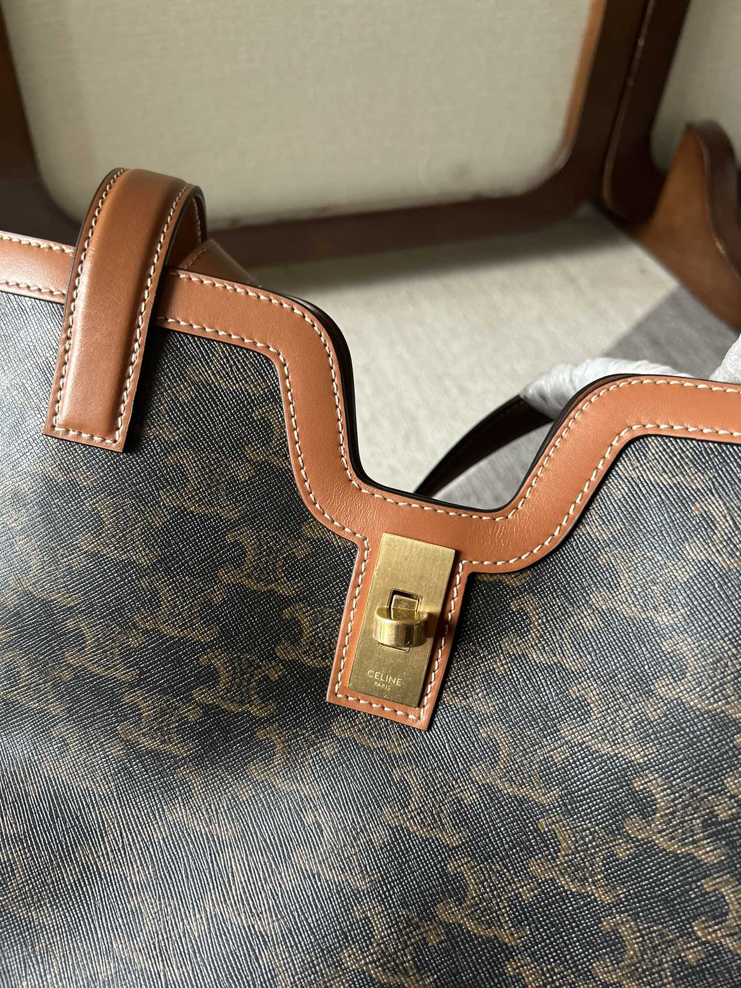 CABAS 37 IN BLACK TRIOMPHE CANVAS AND BRONZE BROWN CALFSKIN TRIM GOLD LOCK