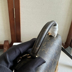 TEEN NINO BAG 20 IN BLACK TRIOMPHE CANVAS GOLD HARDWARE