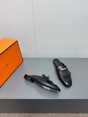 0Z MULE IN BLACK LAMBSKIN WITH FRINGE DETAIL