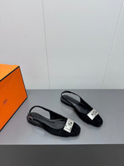 INNOCENTE SLINGBACK IN BLACK SUEDE