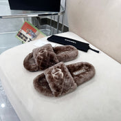 CHANEL 25S FUR SLIPPERS WITH EXPOSED-STITCH STRAPS IN DARK BROWN