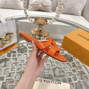 ISOLA FLAT SLIDE IN VIVID ORANGE CALFSKIN