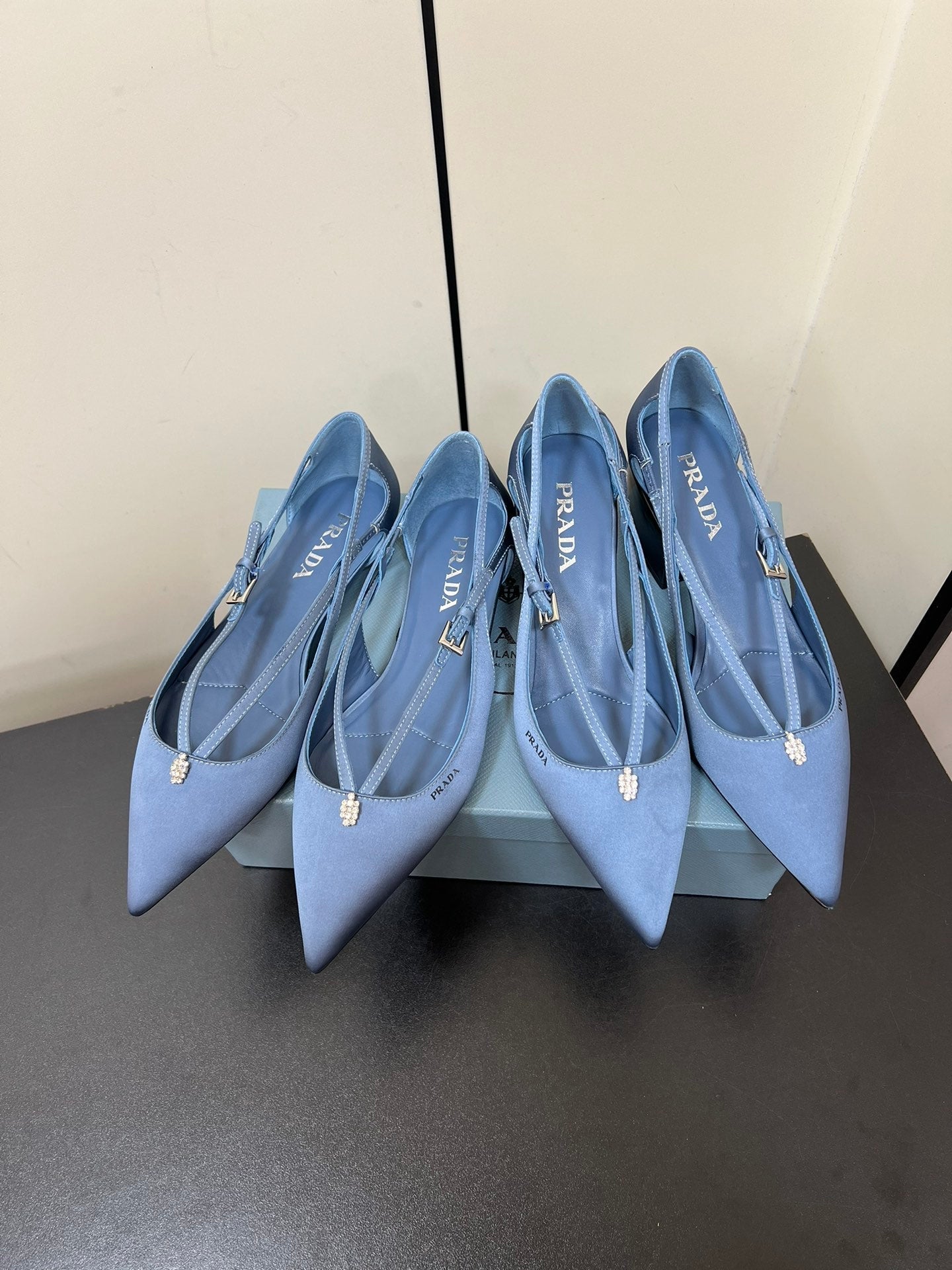 CUT-OUT PUMPS WITH BEAD BUCKLE IN PERANO BLUE SATIN