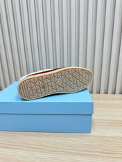 LOAFER IN RED BROWN SUEDE AND FUR LINING ATTACHED TRIANGLE LOGO