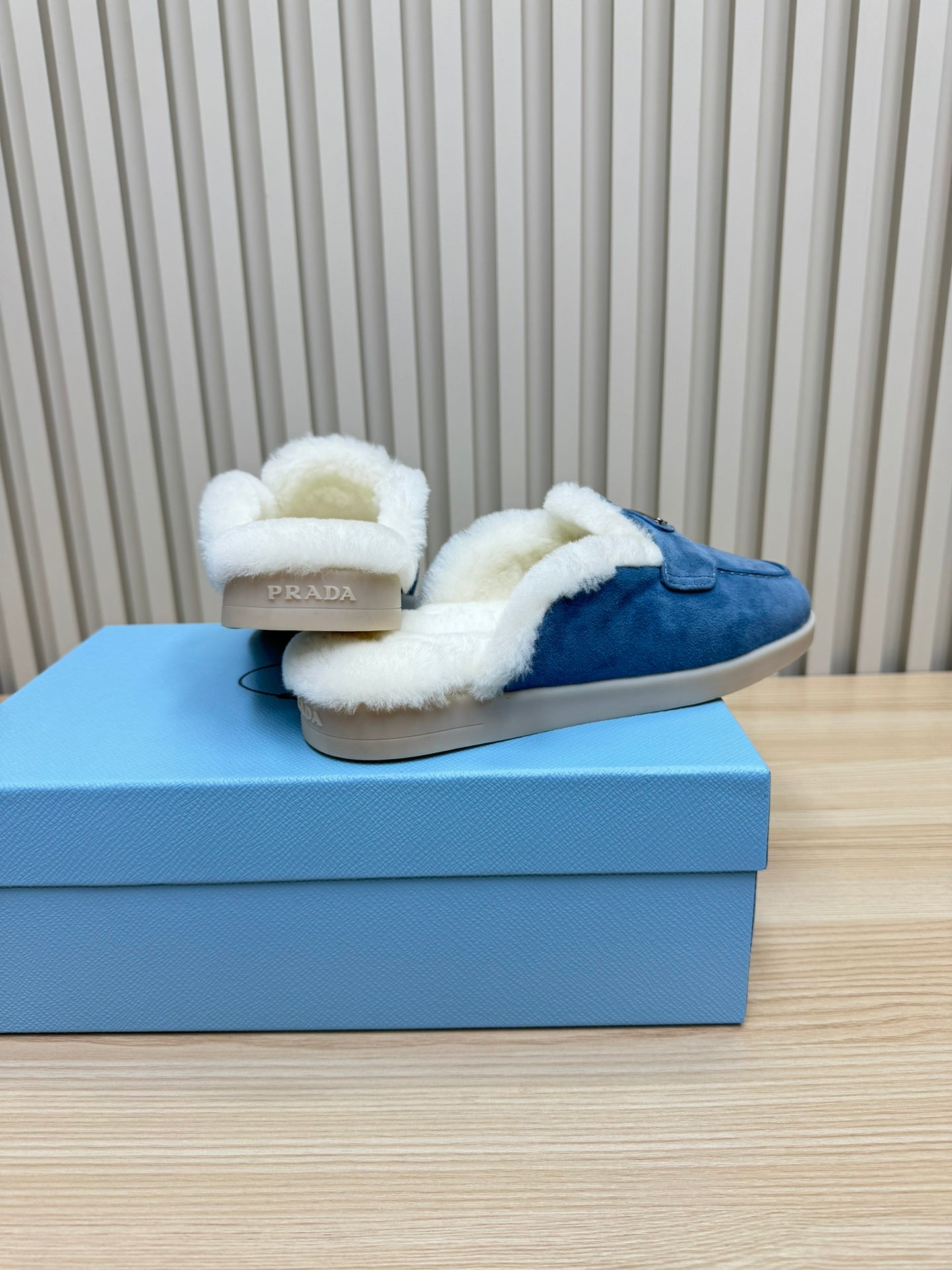 TRIANGLE LOGO FLATS IN AZURE BLUE SUEDE AND FUR LINING