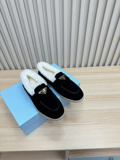 LOAFER IN BLACK SUEDE AND FUR LINING ATTACHED TRIANGLE LOGO