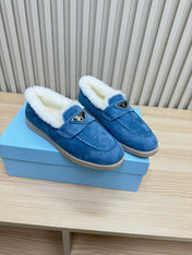LOAFER IN AZURE BLUE SUEDE AND FUR LINING ATTACHED TRIANGLE LOGO