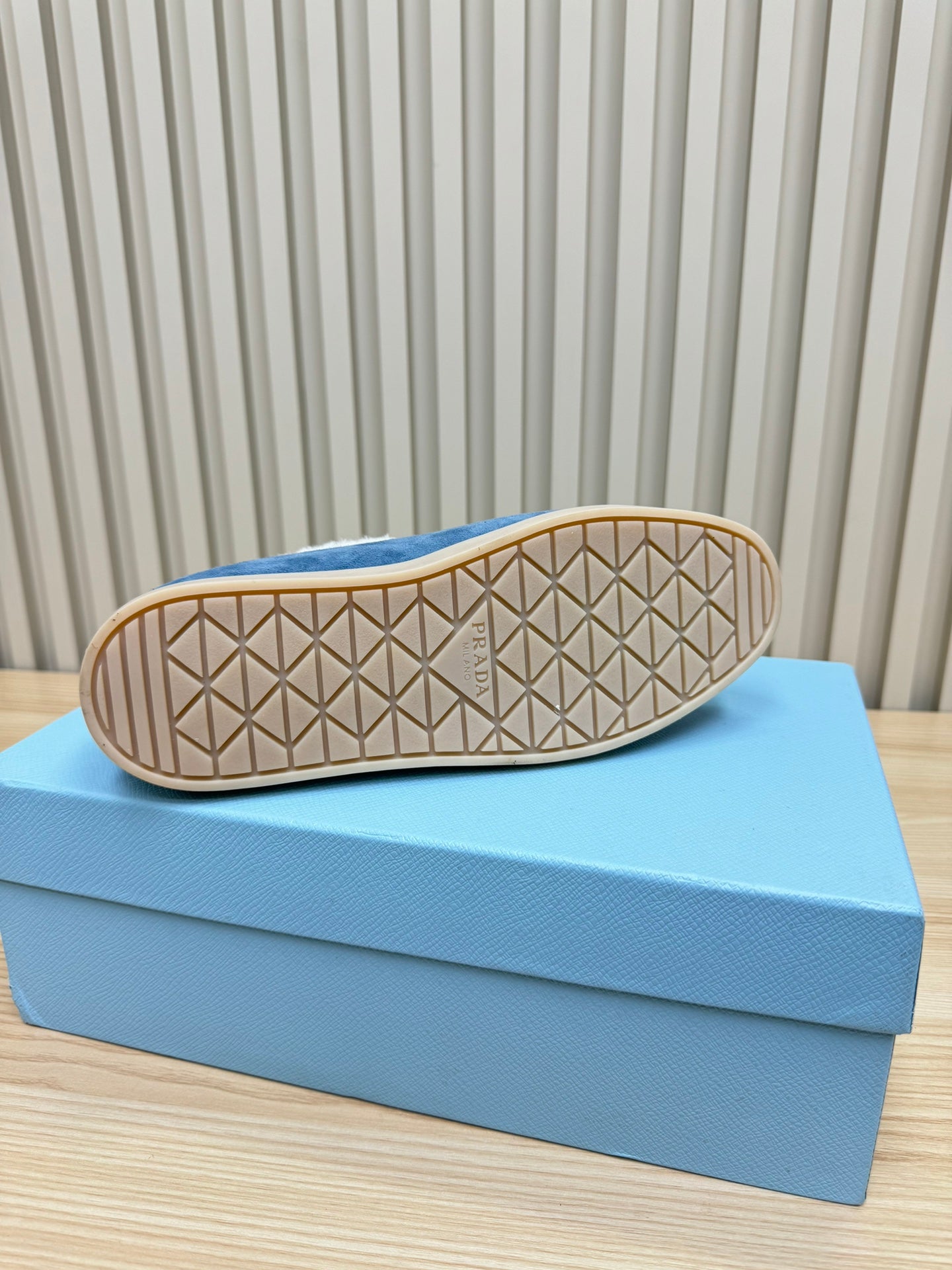 LOAFER IN AZURE BLUE SUEDE AND FUR LINING ATTACHED TRIANGLE LOGO